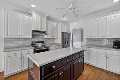 Welcome to Oak Grove Island, where this beautifully maintained - photo 13
