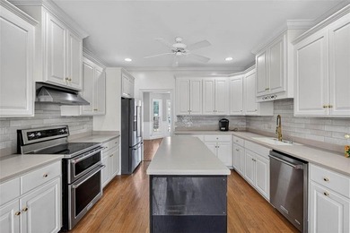 Welcome to Oak Grove Island, where this beautifully maintained - photo 14