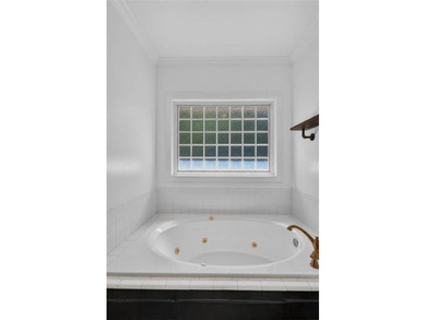 Welcome to Oak Grove Island, where this beautifully maintained - photo 21