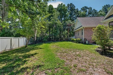 Welcome to Oak Grove Island, where this beautifully maintained - photo 35