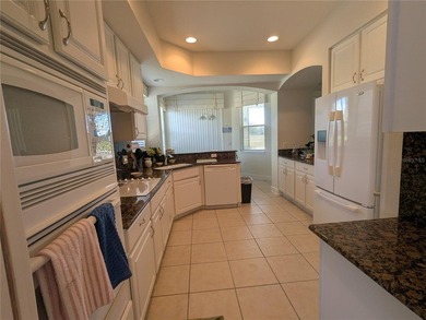 This is the one and only ground floor end-unit with direct golf - photo 4