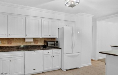 Welcome to Packanack Lake, where lifestyle meets location! This - photo 14
