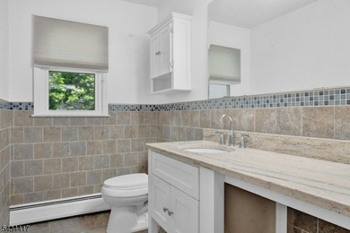 Welcome to Packanack Lake, where lifestyle meets location! This - photo 18