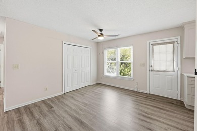 Nestled behind mature native landscaping, this home doesn't just - photo 3