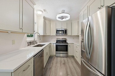 Nestled behind mature native landscaping, this home doesn't just - photo 5