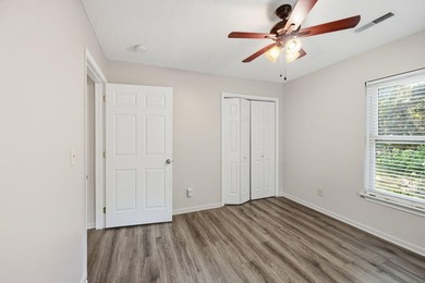 Nestled behind mature native landscaping, this home doesn't just - photo 10