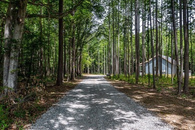 Step inside a NEWLY built home that radiates warmth and modern