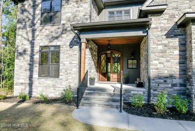 Welcome to this stunning 3,700 sf waterfront home built by - photo 2