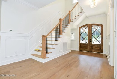 Welcome to this stunning 3,700 sf waterfront home built by - photo 4