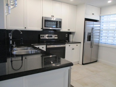 Welcome to this exceptionally remodeled second floor corner - photo 24