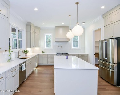 Welcome to this stunning 3,700 sf waterfront home built by - photo 6