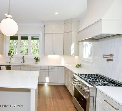 Welcome to this stunning 3,700 sf waterfront home built by - photo 8