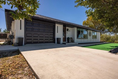 Set on over an acre of land, 19267 Hansen Trail is a truly - photo 2