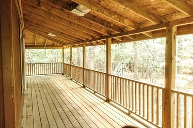 Surrounded by nature, this charming 3-bedroom, 2-bath waterfront - photo 2