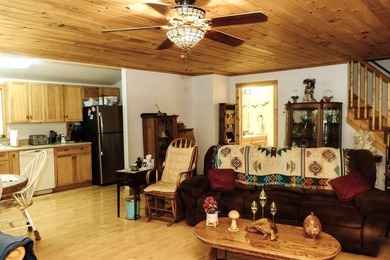 Surrounded by nature, this charming 3-bedroom, 2-bath waterfront - photo 4