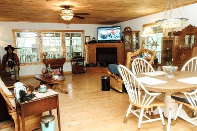 Surrounded by nature, this charming 3-bedroom, 2-bath waterfront - photo 5