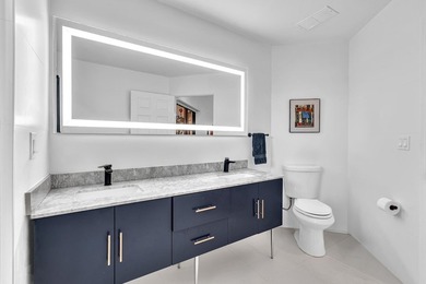 Welcome to this exceptionally remodeled second floor corner - photo 35