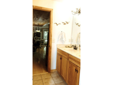 Surrounded by nature, this charming 3-bedroom, 2-bath waterfront - photo 8