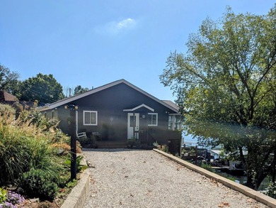Beautifully landscaped lakefront home centrally located just - photo 3