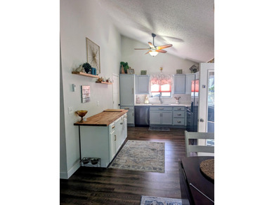 Beautifully landscaped lakefront home centrally located just - photo 10