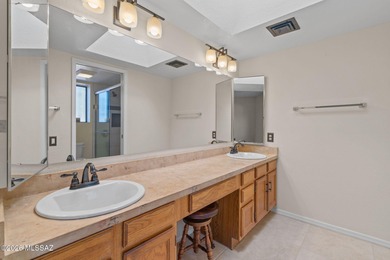 This charming standalone townhome in a welcoming 55+ Green