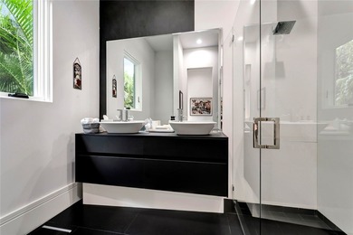 Located in Riomar Bay II, this 3 BD/4.5 BA residence blends - photo 19
