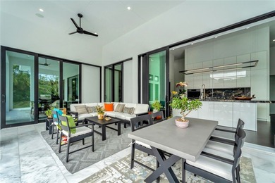 Located in Riomar Bay II, this 3 BD/4.5 BA residence blends - photo 21