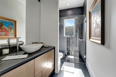 Located in Riomar Bay II, this 3 BD/4.5 BA residence blends - photo 26