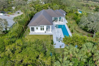 Located in Riomar Bay II, this 3 BD/4.5 BA residence blends - photo 34