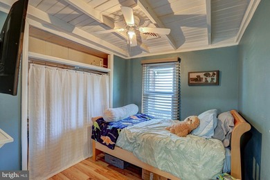 Enjoy waterfront living in this beautifully renovated cottage - photo 9