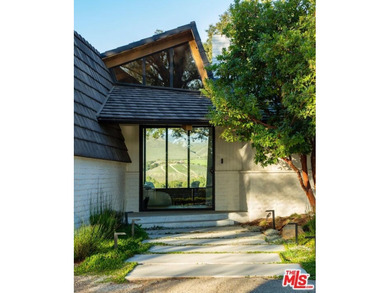 Unparalleled beauty and style define this reimagined ranch - photo 9
