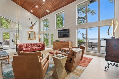 Set along the shores of Lake Greeson, this exceptional lakefront - photo 2