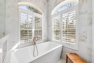 This beautifully renovated completely furnished home is located - photo 25