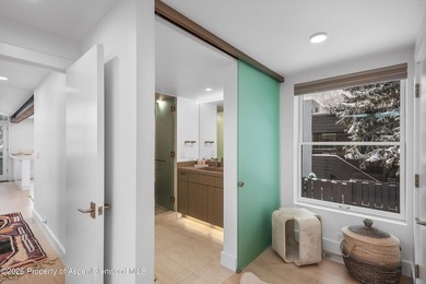 Settle into the Aspen lifestyle from this inviting three-bedroom - photo 11