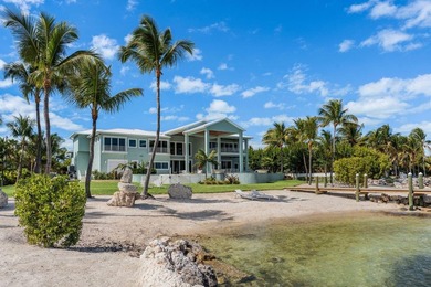 Newly completed in 2025, this exceptional oceanfront estate is