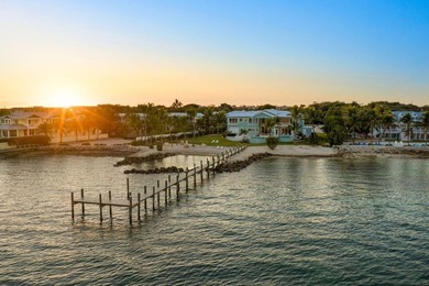 Newly completed in 2025, this exceptional oceanfront estate is