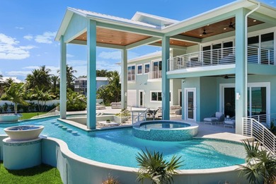 Newly completed in 2025, this exceptional oceanfront estate is