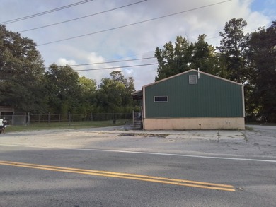 30 x 70 building with loading dock , open warehouse with office