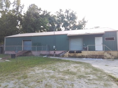 30 x 70 building with loading dock , open warehouse with office