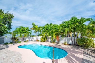 Nestled on the picturesque shores of Ramrod Key, this stunning - photo 5