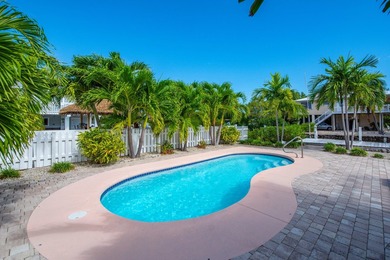 Nestled on the picturesque shores of Ramrod Key, this stunning - photo 10