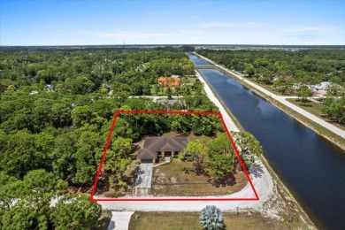 Lake Home For Sale in The Acreage, Florida