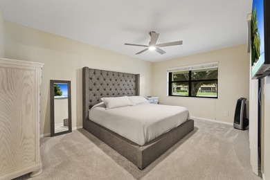 Welcome to this charming corner unit three-bedroom, two-bathroom - photo 11