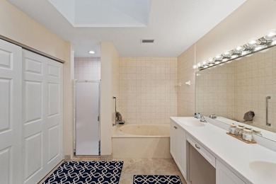 Welcome to this charming corner unit three-bedroom, two-bathroom - photo 16