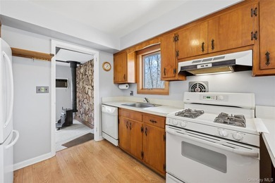 This lovely Hampton Bays residence sits on .47 acres and offers - photo 18