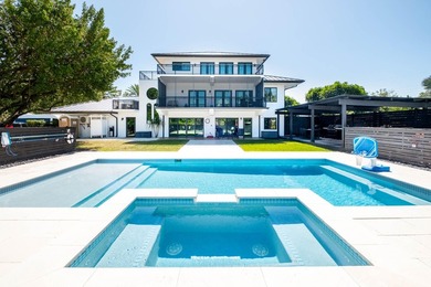 Beautifully remodeled 1998 concrete home is situated on a - photo 1