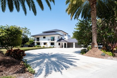 Beautifully remodeled 1998 concrete home is situated on a - photo 2