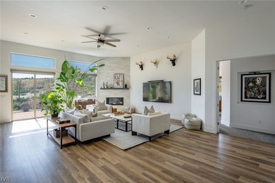 Set within the gated Champion Hills enclave of Somersett beneath - photo 2