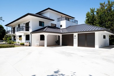 Beautifully remodeled 1998 concrete home is situated on a - photo 3