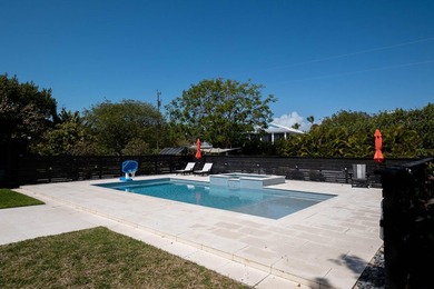 Beautifully remodeled 1998 concrete home is situated on a - photo 4